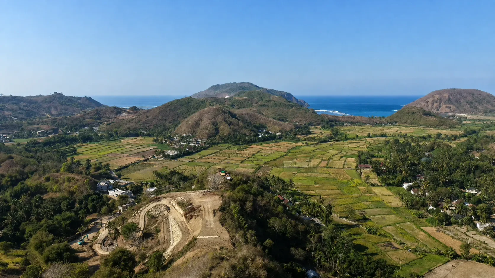 2.1-Hectare Freehold Land with Views over Three Bays in Mawun photo